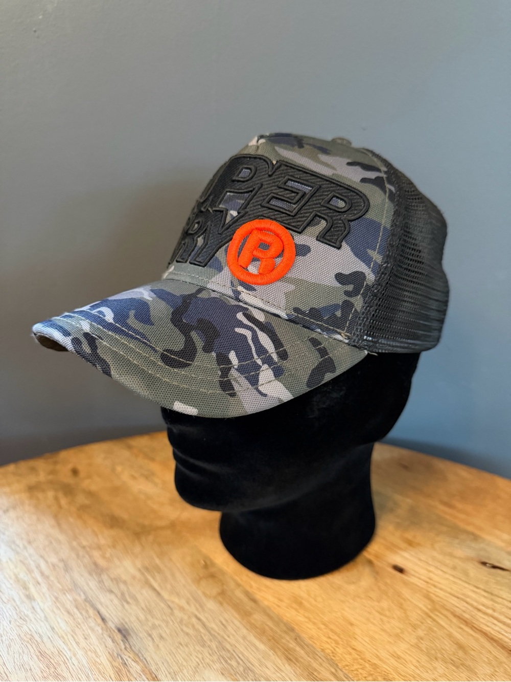 Superdry Men’s Camo Trucker Hat with Embroidered Logo Adjustable fit.